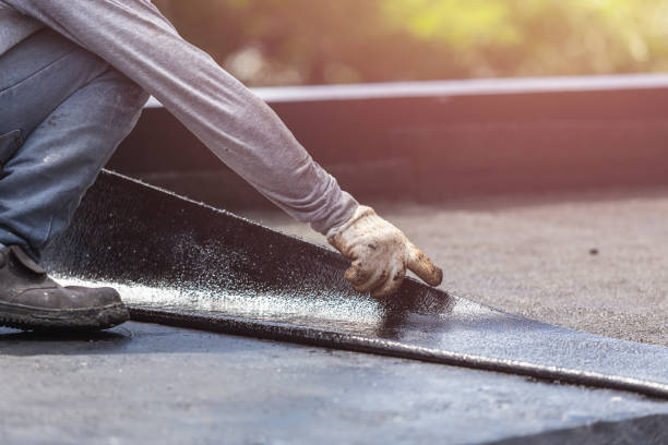 Professional Basement Waterproofing technician working in Hamlet, NC